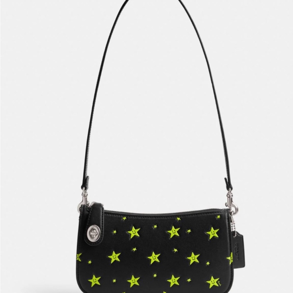 Cosmic Coach Penn Shoulder Bag
With Star Print